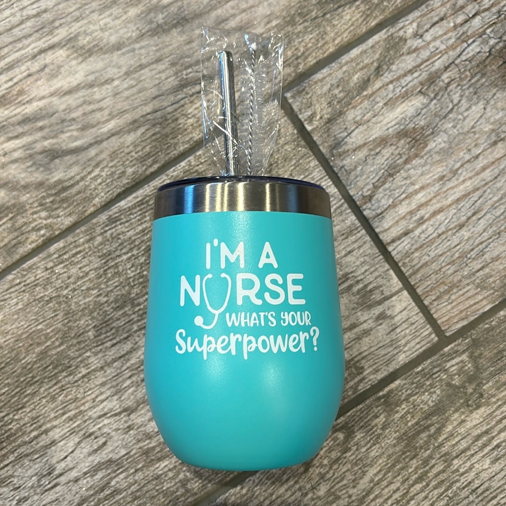 Nurse Tumbler. Brand new, never used. Comes with straw and cleaner.